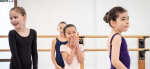Young dancers laughing